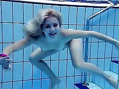 Bald pussy teen goes skinny dipping