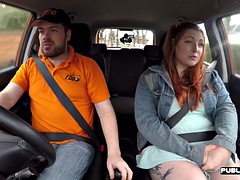 Curvy redhead tattooed babe publicly fucked in car by instructor