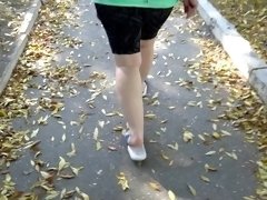 BBW in flip flops walks along the sidewalk while a voyeur peeps on her feet Public foot fetish