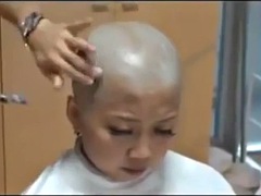 Two Japanese men shaved their heads